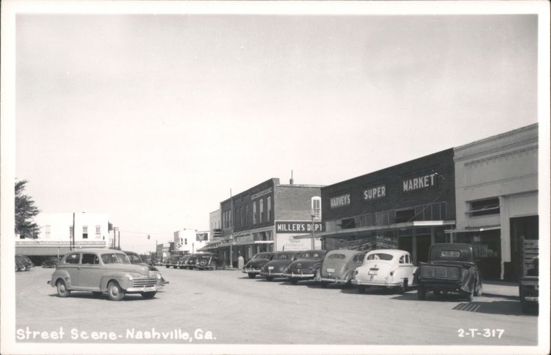 Street Scene with 1940s Cars and Storefronts Nashville Georgia