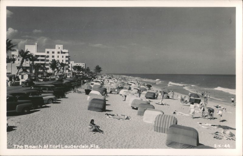 Busy Beach Scene with Vintage Cars and Hotels Fort Lauderdale Florida
