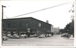 Street Scene with Rose's 5-10-25¢ and Rexall Drug Stores Postcard