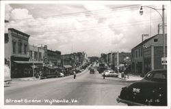 Street Scene with Vintage Cars and Storefronts Postcard
