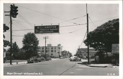 Williamston "The Tobacco Market" sign over Main Street Postcard