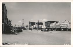 Downtown Street Scene with Vintage Cars Postcard