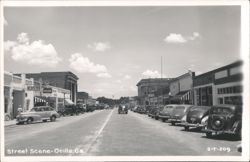 Downtown Street Scene with Vintage Cars Postcard