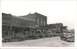 Street Scene with Vintage Cars and Storefronts Postcard