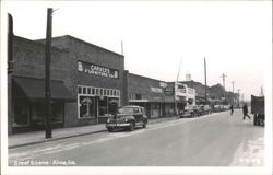 Street Scene with Carver's Furniture Co. and Alma Drugs Postcard