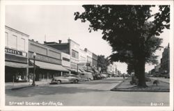 Street Scene with Vintage Cars and Storefronts Postcard