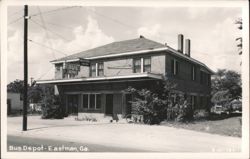 Bus Depot and Western Union Building Postcard