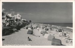 Busy Beach Scene with Vintage Cars and Hotels Postcard