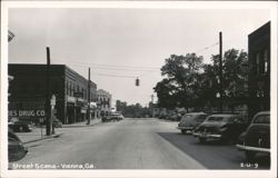Street Scene with Forbes Drug Co. and Hotel Postcard