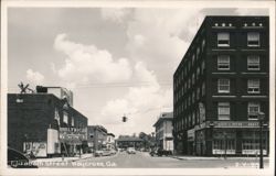 View of Elizabeth Street with Lyric Theatre and Cecil L. Spear Drugs Postcard