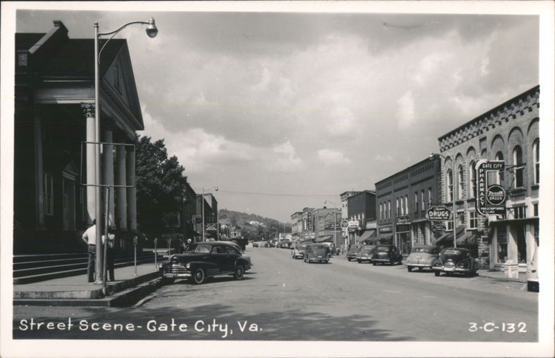 Downtown Street View with Pharmacy, Hotel, and Classic Cars Gate City Virginia