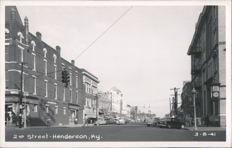 2nd Street downtown with businesses and cars Henderson Kentucky