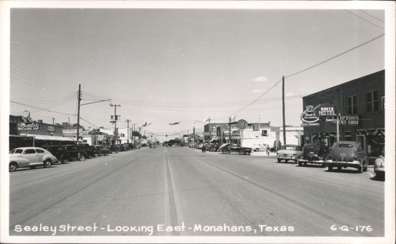 Sealey Street with businesses and vintage cars Monahans Texas