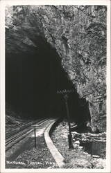 Natural Tunnel with Railroad Tracks and Telegraph Pole Postcard
