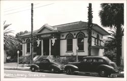 Public Library Building (1916) with Vintage Cars Postcard