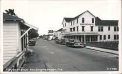 River View Hotel and Flagler Avenue street scene with vintage cars Postcard