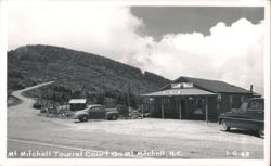 Mt. Mitchell Tourist Court, Winding Road, and Vintage Cars Postcard