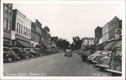 Downtown Street Scene with Cars and Shops Postcard