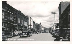 Greeneville Street Scene with 1940s Cars and Businesses Postcard