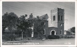 Brick Catholic Church with Tower and Trees Postcard