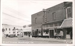 Street Scene with Rexall Drugs, Gulf, and Harper's Grocery Postcard