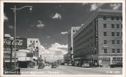 Street Scene with Scharbauer Hotel, Coca-Cola Sign, and Woodford Drugs Postcard