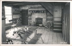 Lincoln Cabin interior with fireplace, spinning wheel, and rustic furniture Postcard