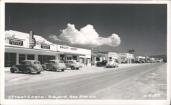 Main Street Businesses and Vintage Cars Postcard