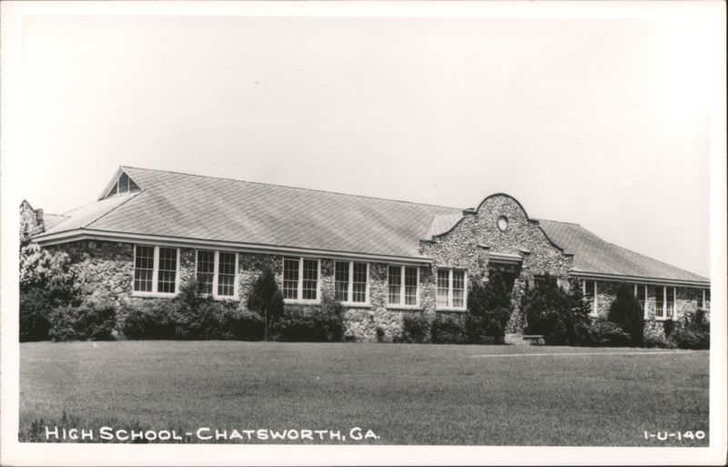 Historic Stone High School Building with Gabled Roof and Arched Entrance Chatsworth Georgia