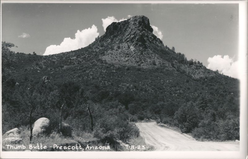 Thumb Butte with Dirt Road and Clouds Prescott Arizona