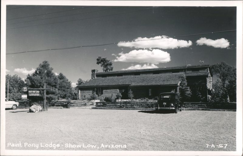 Paint Pony Lodge, Log Cabin Style Building with Horse Weathervane Show Low Arizona