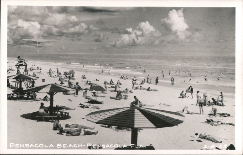 Crowded Beach Scene with Umbrellas and Lifeguard Stand Pensacola Florida