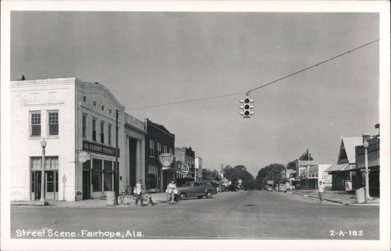 Downtown Street Scene with Businesses, Pedestrians, and Traffic Light Fairhope Alabama