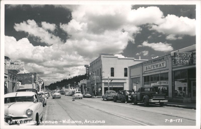 Bill Williams Avenue with Shops and Classic Cars under Cloudy Sky Arizona