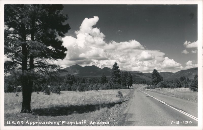 U.S. 89 Approaching Flagstaff, Arizona, with Mountains and Clouds