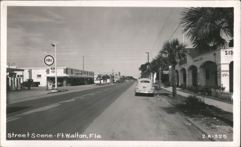 Street Scene with Pure Gas Station, Sidewalk Cafe, and Palm Trees Fort Walton Beach Florida