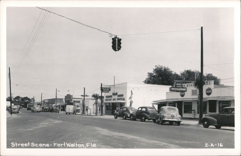 Fort Walton Street Scene with Businesses, Vintage Cars, and Traffic Light Fort Walton Beach Florida