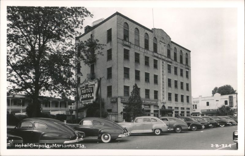 Hotel Chipola and street scene with vintage automobiles Marianna Florida