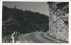 U.S. 68 Winding Road with Rock Cliff and Cars Postcard