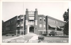 High School Building with Arched Entrance and Awnings Postcard