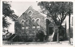 First Christian Church building, stone facade, arched windows Postcard