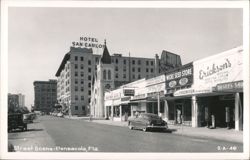 Street Scene with Hotel San Carlos, Western Auto, Wicke Seed Store, Erickson's Postcard