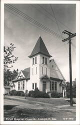 First Baptist Church with steeple and power lines Postcard