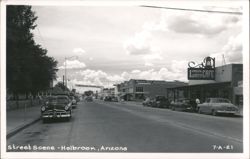 Street Scene with Green Lantern Cafe, Western Auto, and Hopi Snake Dance Banner Postcard