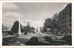 Street Scene with Obelisk, Vintage Cars, and Hotel Chipola Postcard