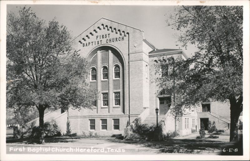 First Baptist Church building with trees Hereford Texas