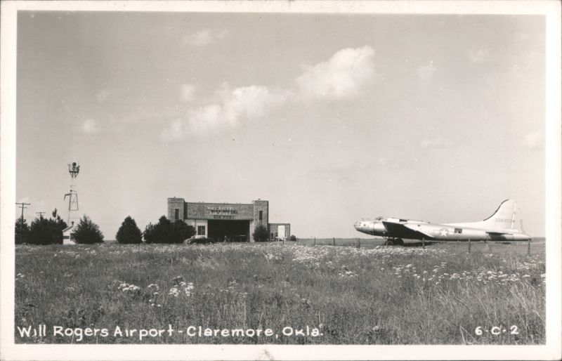 Will Rogers Airport with large airplane and hangar in Claremore, Oklahoma