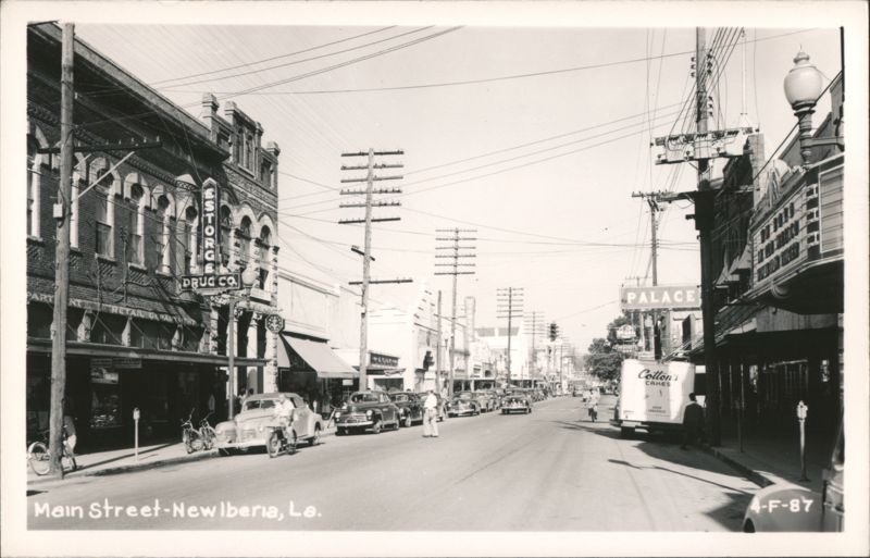 Main Street with cars and businesses, New Iberia Louisiana