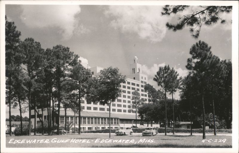 Edgewater Gulf Hotel with Pine Trees and Cars Mississippi