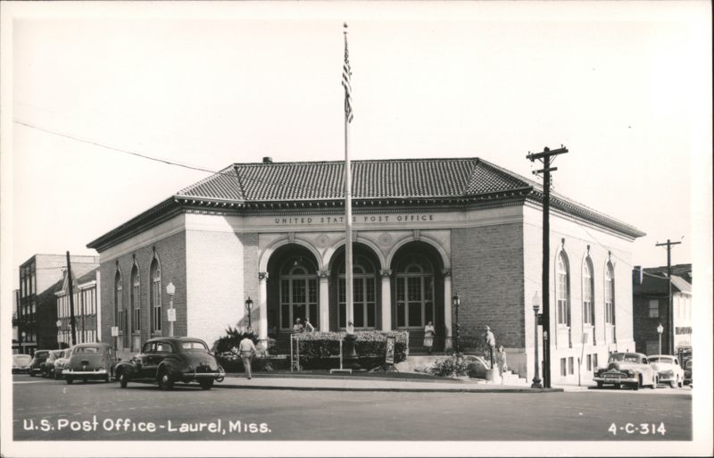 U.S. Post Office building with arched windows and flag pole Laurel Mississippi